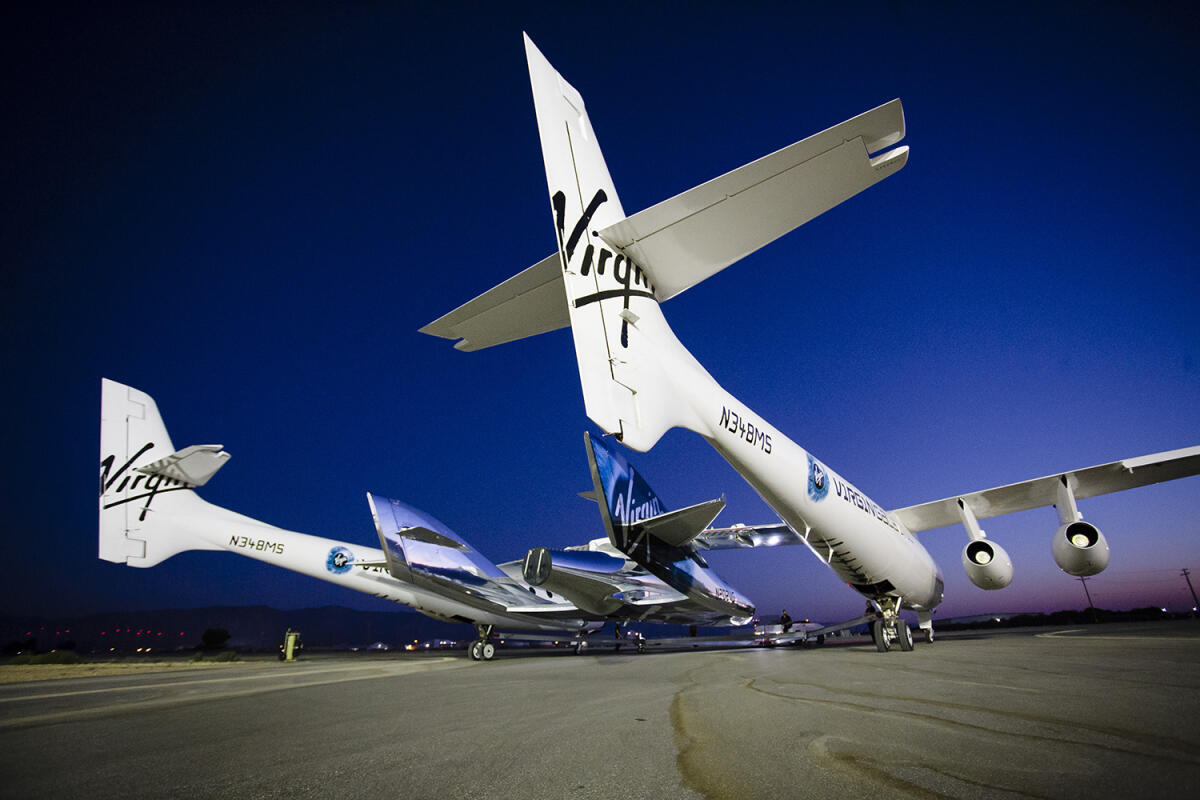 Sorgerà in Puglia il primo spazioporto italiano - La Virgin Mothership Eve con agganciata la Virgin Spaceship Unity, crediti: s3.amazonaws.com