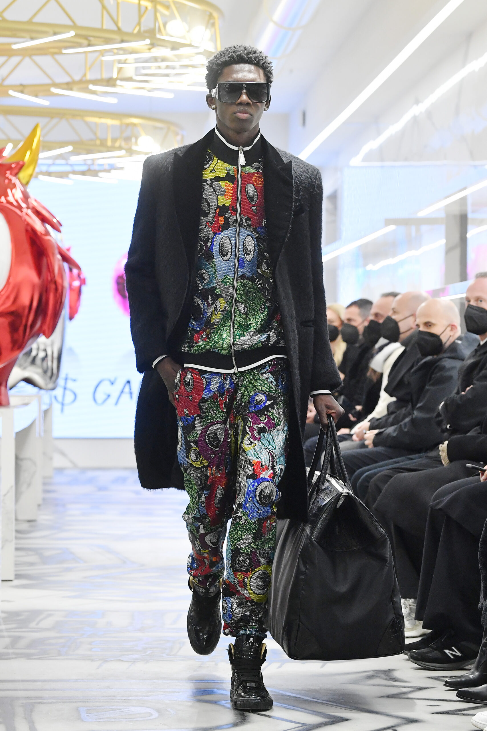 MILAN, ITALY – JANUARY 15: A model walks the runway at the Philipp Plein “Little Monsters” Capsule Collection FW22/23 on January 15, 2022 in Milan, Italy. (Photo by Jacopo M. Raule/Getty Images for Philipp Plein)
