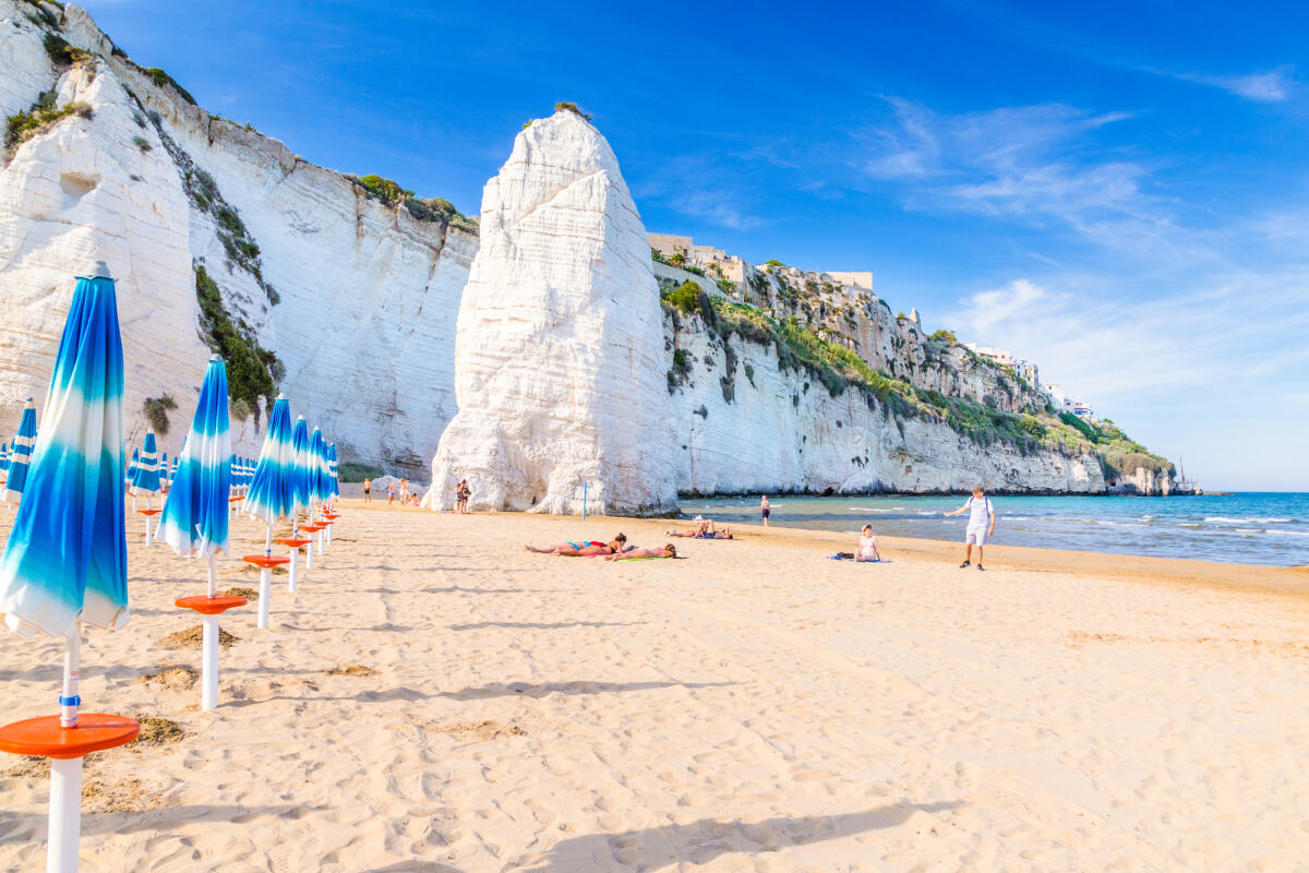 Vieste, per salvare la nipotina in difficoltà donna di 57 anni muore annegata - Vieste, Apulia, Italy, 30 May 2017. Beach of Pizzomunno rock, at Vieste, Apulia region , South  Italy