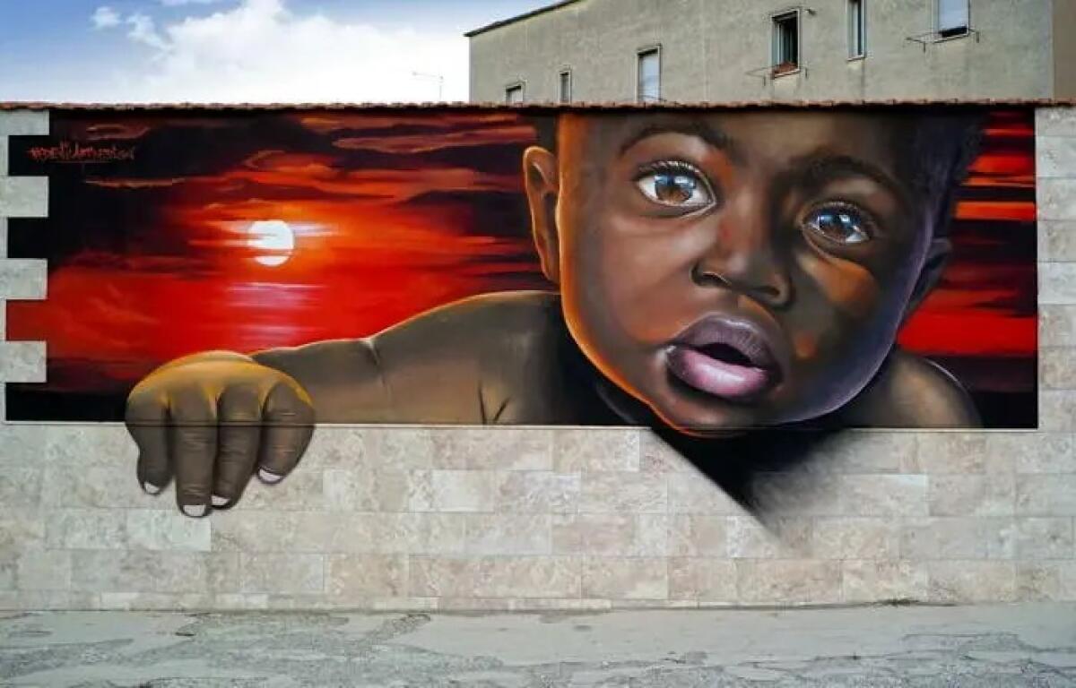 Stornara, il paese dei murales: 153 opere e l’amore raccontato sui muri - 
